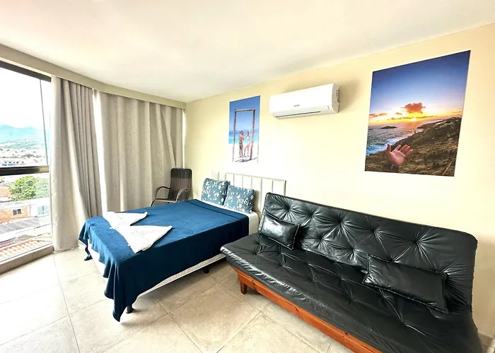 Apartamento com 2 quartos até 7 Pessoas- Orla da Praia Grande